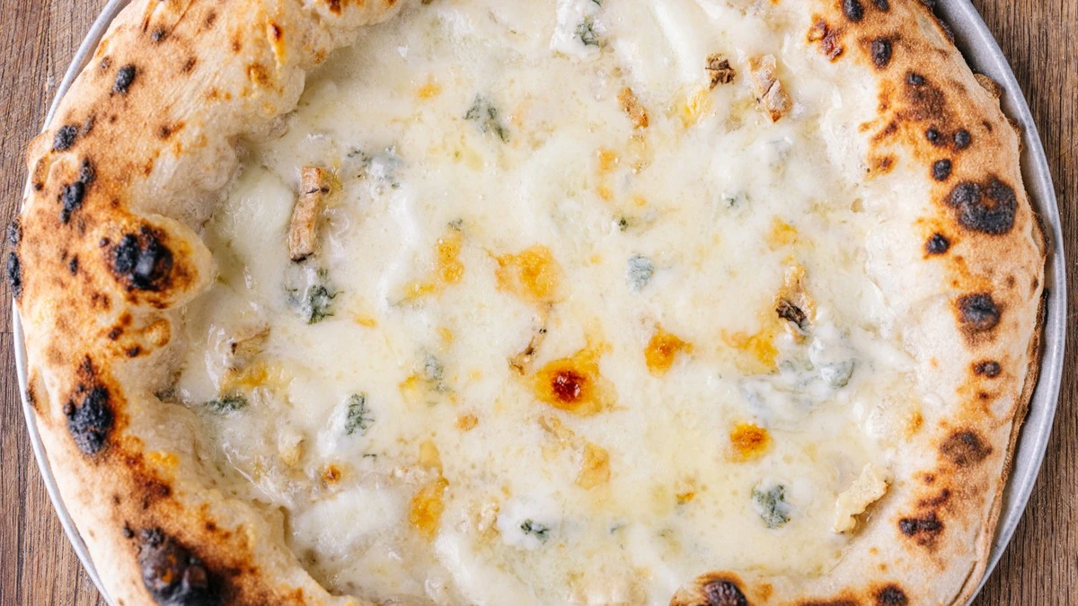 Dlaczego profesjonalni pizzaiolo zawsze czekają na czwarty rodzaj sera - image 1